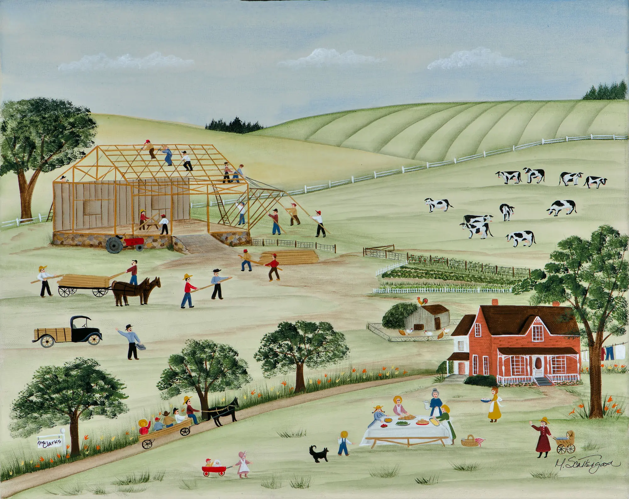 Cows grazing near a busy farmhouse