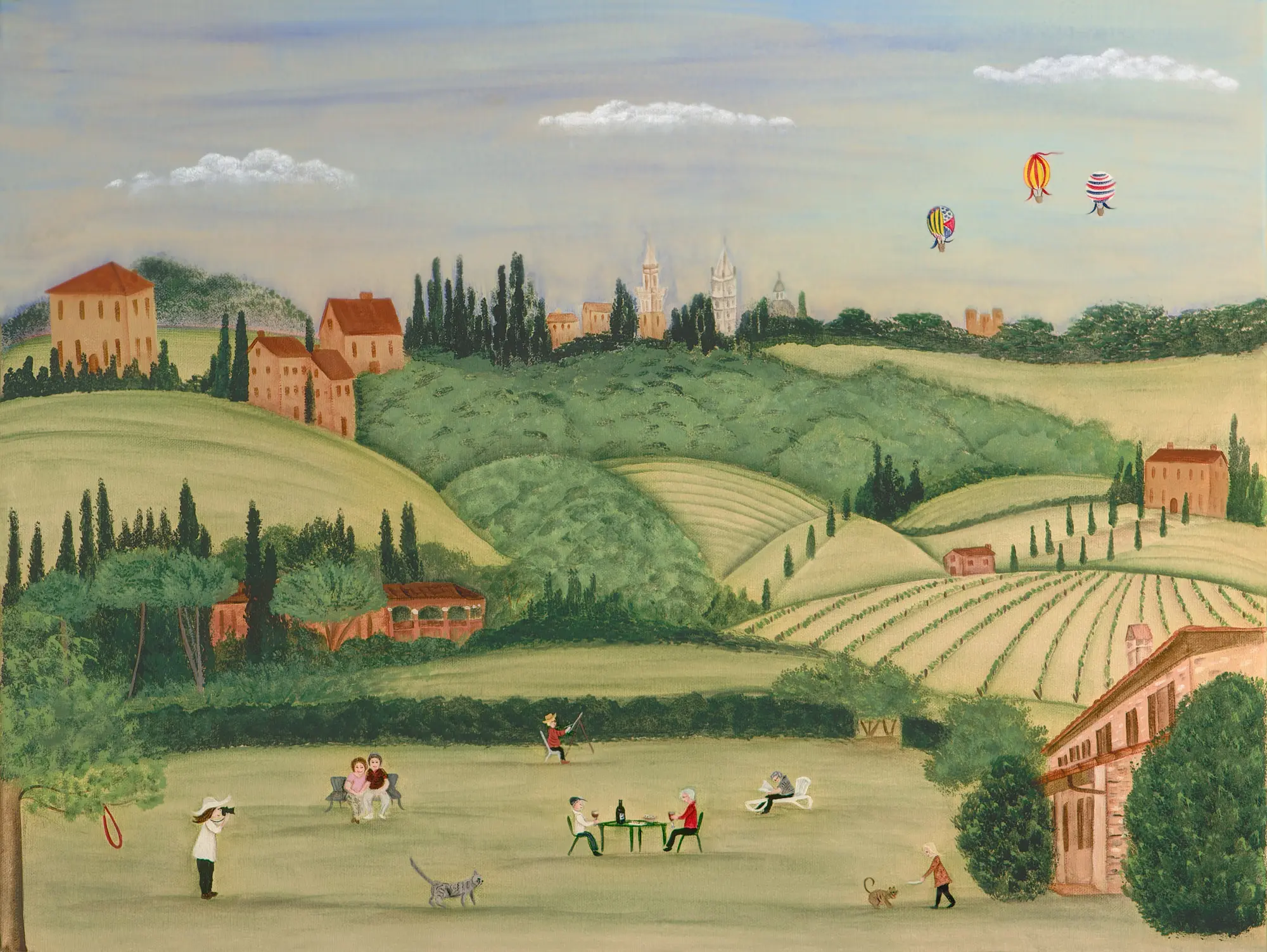 Countryside scene with people and hot air balloons.