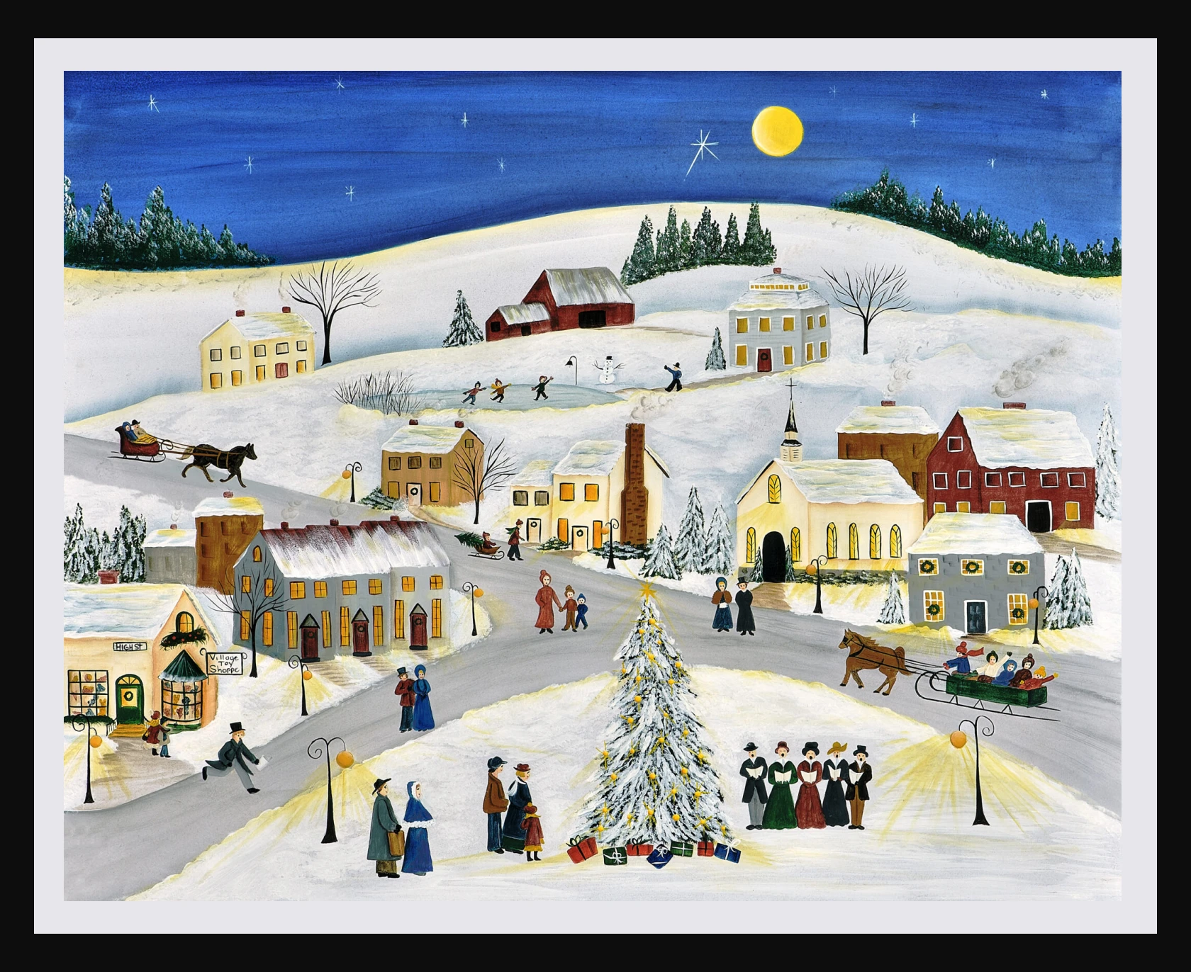 Snowy village at night with Christmas tree